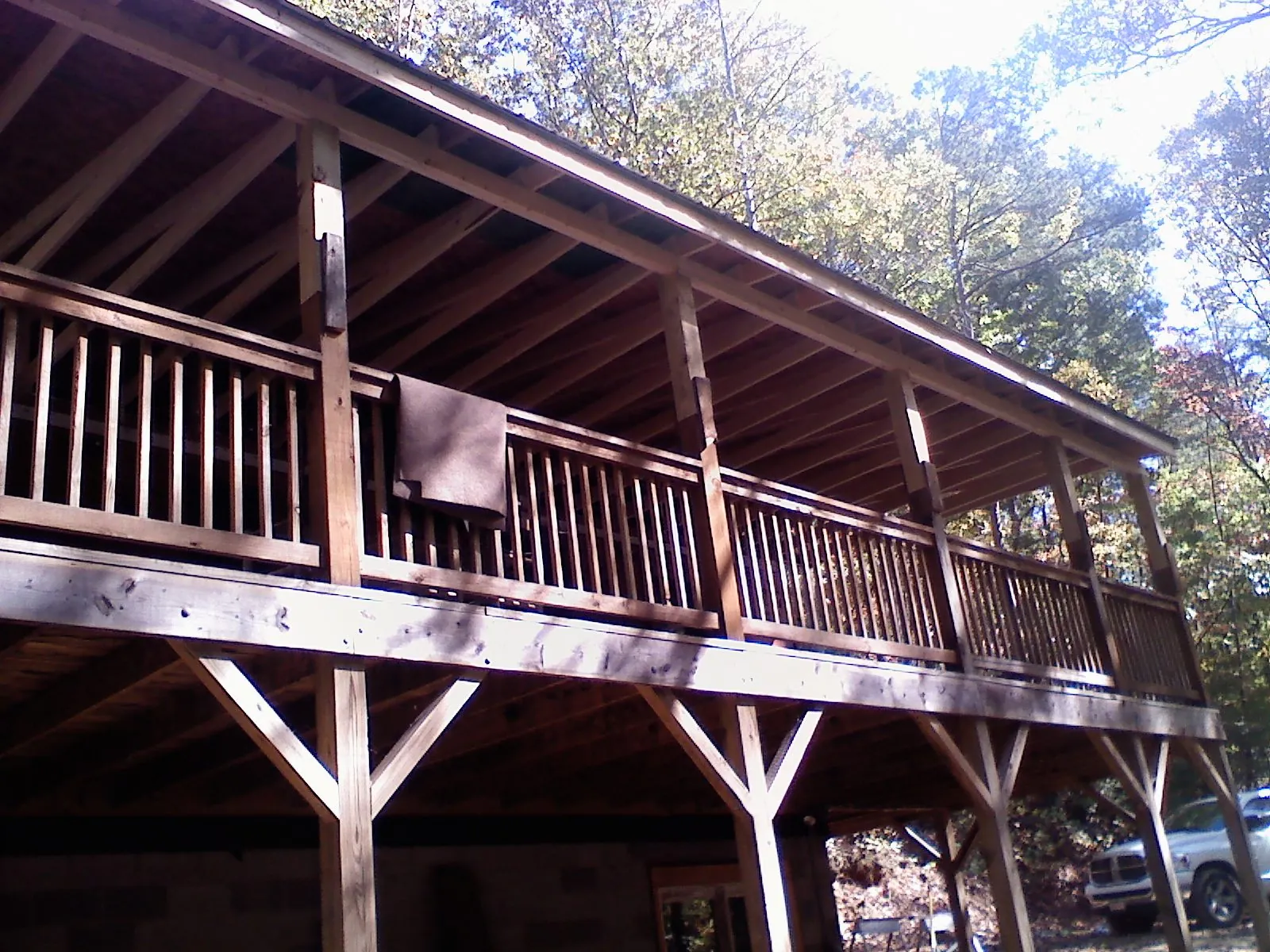 Timber framing under a new elevated porch and deck — Roof Leak Repair in Lenexa by Roofing Brothers